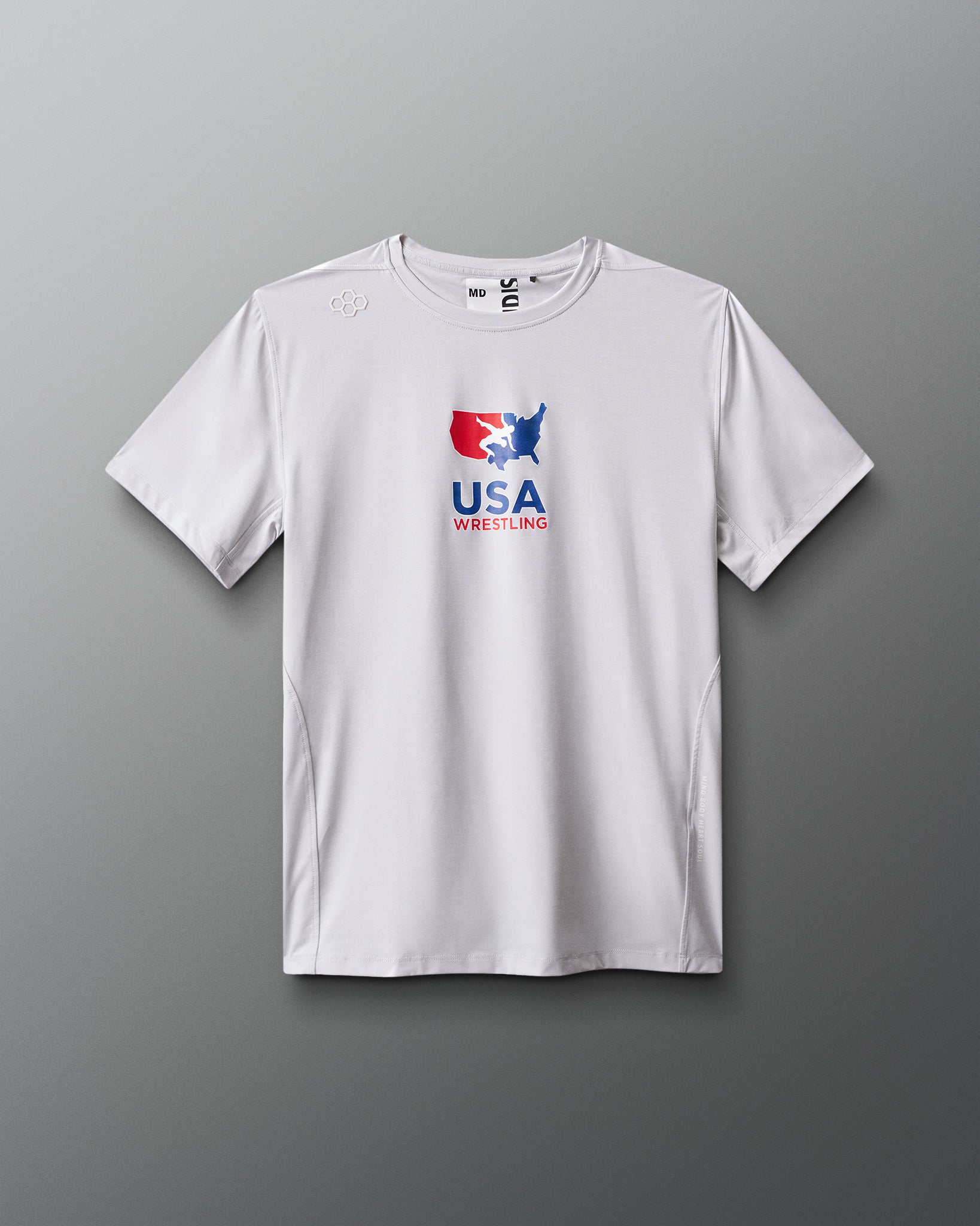 White t-shirt with USA Wrestling logo on a gray background