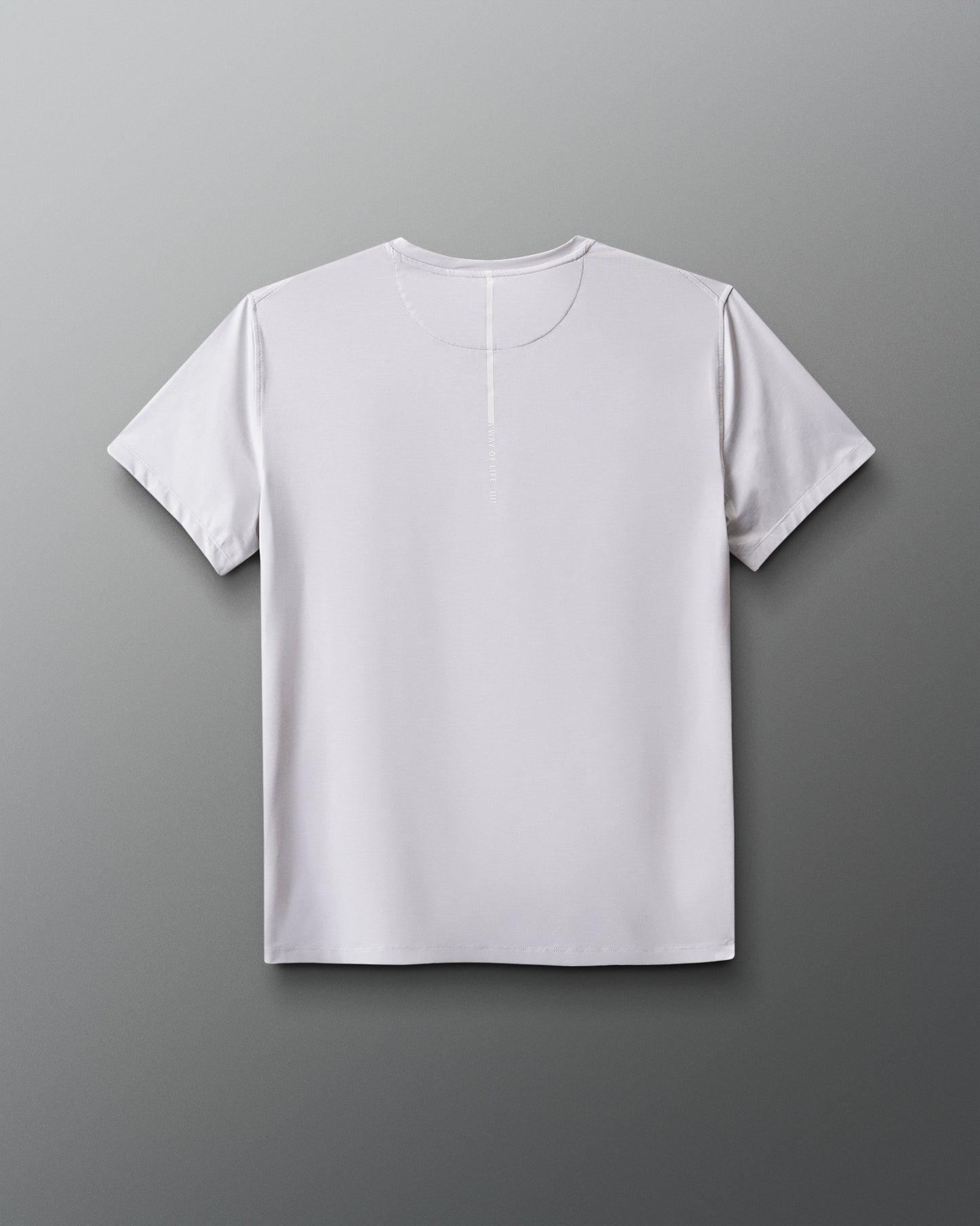 White t-shirt on a gradient blue to red background