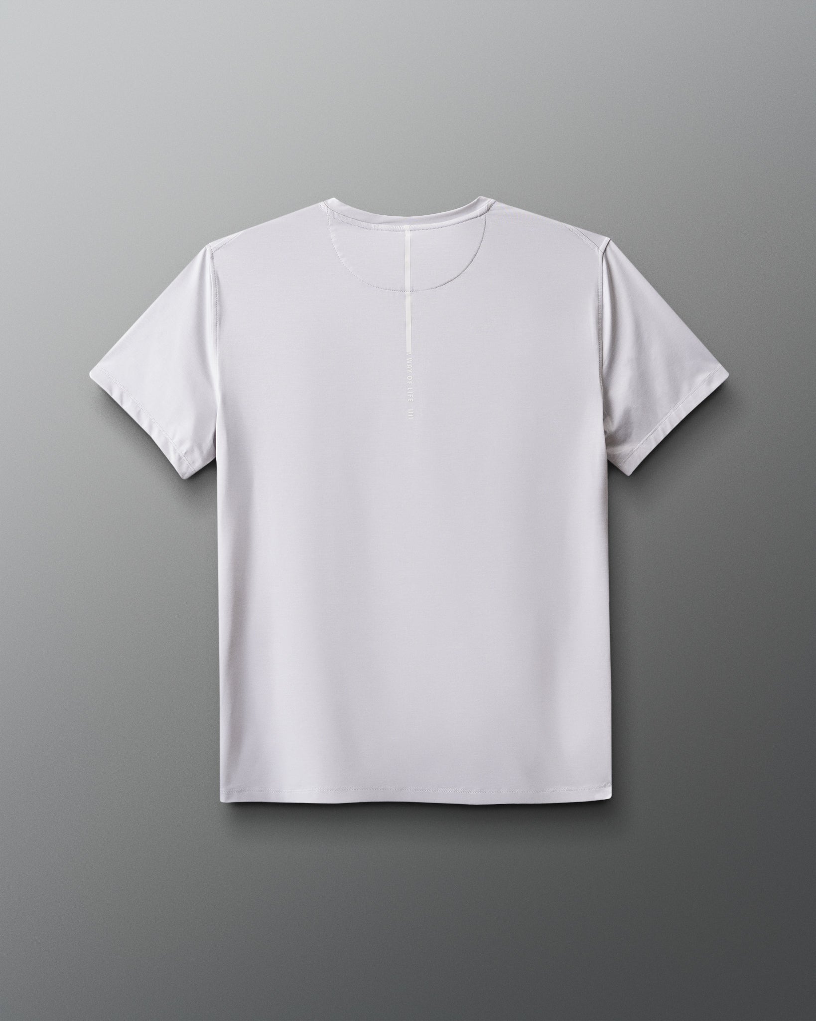 White t-shirt on a gradient blue to red background