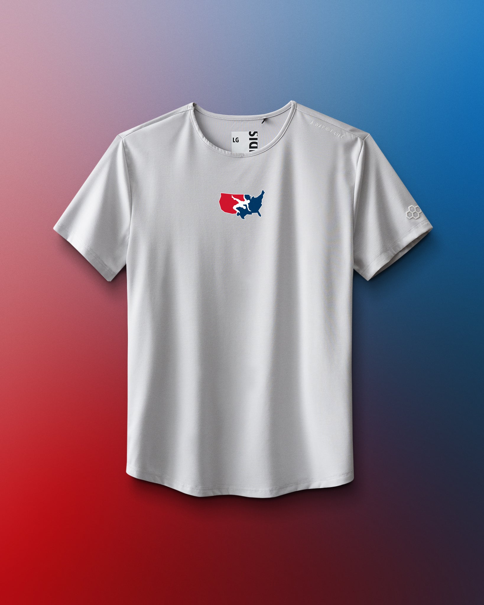 White t-shirt with a colorful logo on a gradient red and blue background