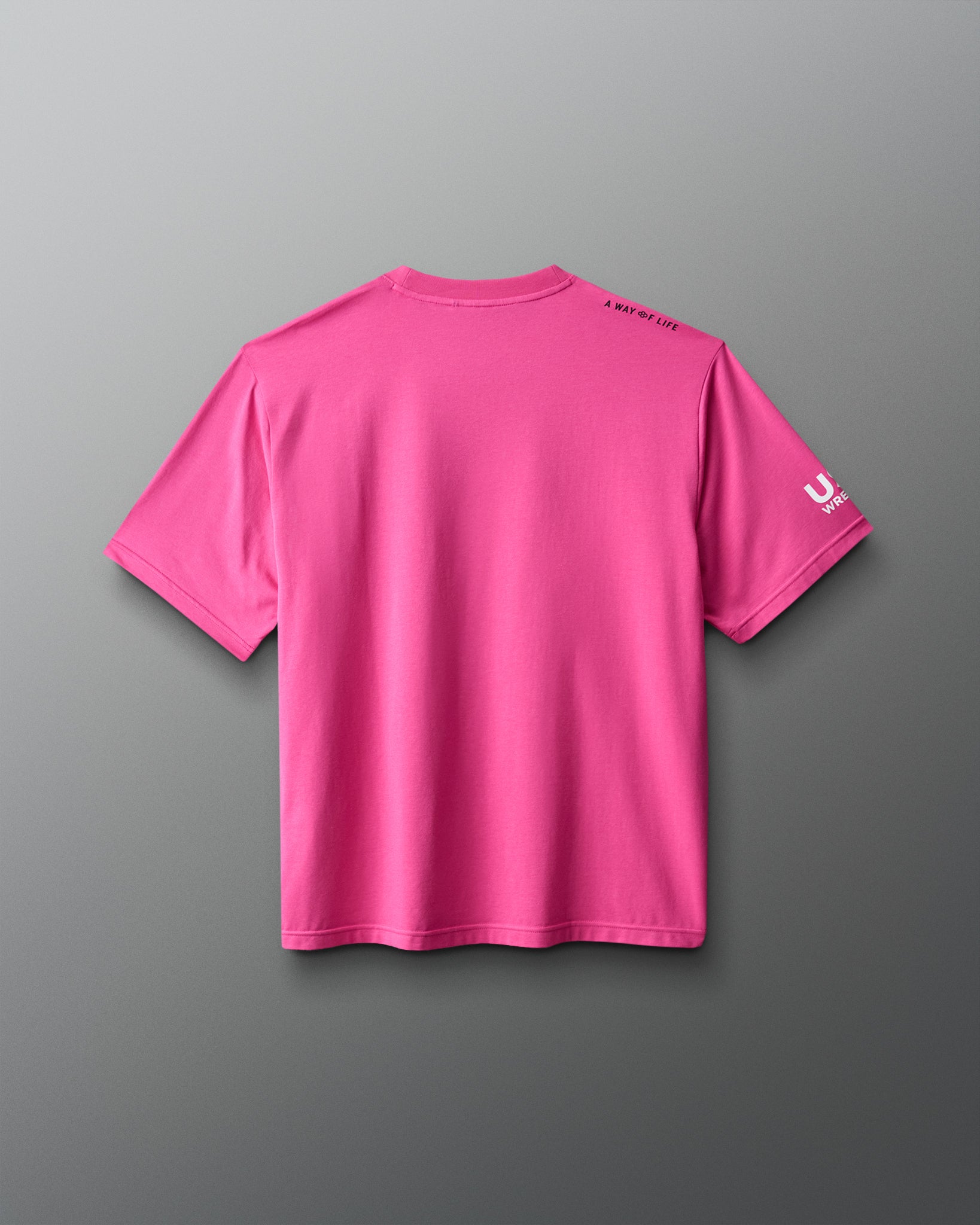Pink t-shirt on a gray background