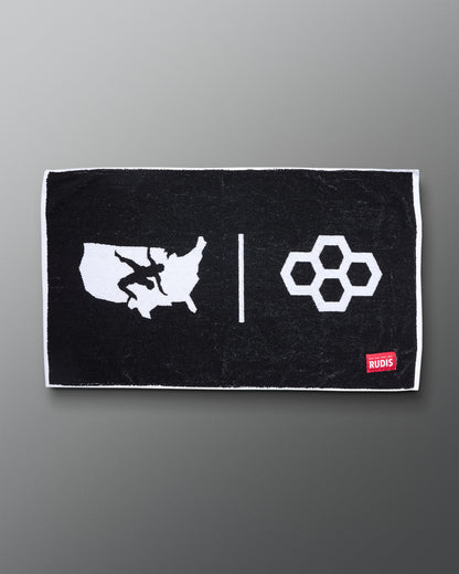 USA Wrestling Black towel with white graphics and a red logo on a gray background