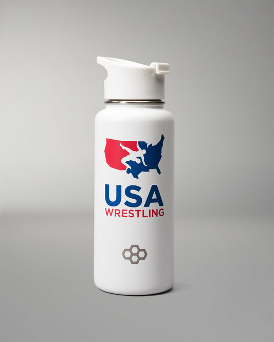 A white insulated water bottle with a flip-top lid, featuring a USA Wrestling graphic with a red and blue map silhouette and logo on a gray gradient background.