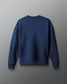 Back view of the navy RUDIS UWW Globe Relaxed Comfort Fleece Crewneck, featuring a clean tonal design with subtle RUDIS branding below the back neckline and a tonal RUDIS mark on the sleeve.