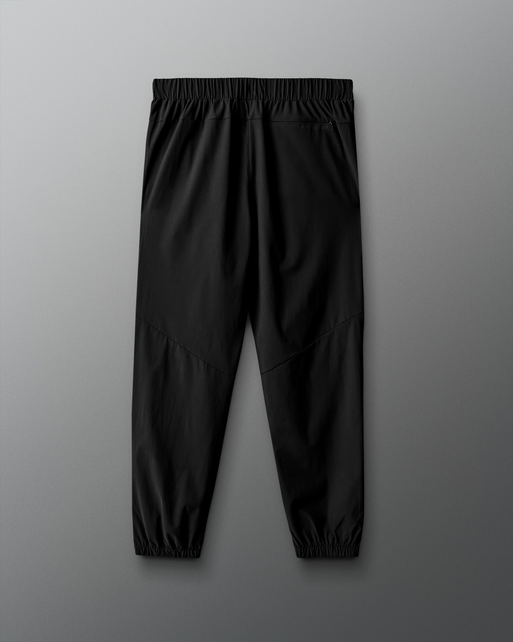 Black pants on a gray background