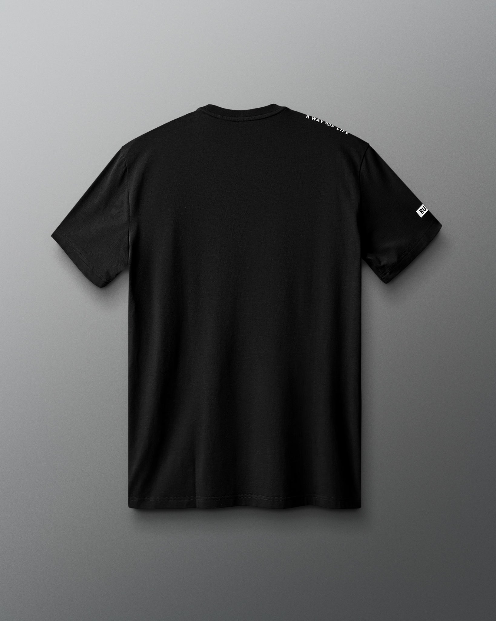 Black t-shirt on a gray background