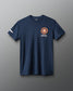 Navy blue t-shirt with a logo on the chest against a gray background
