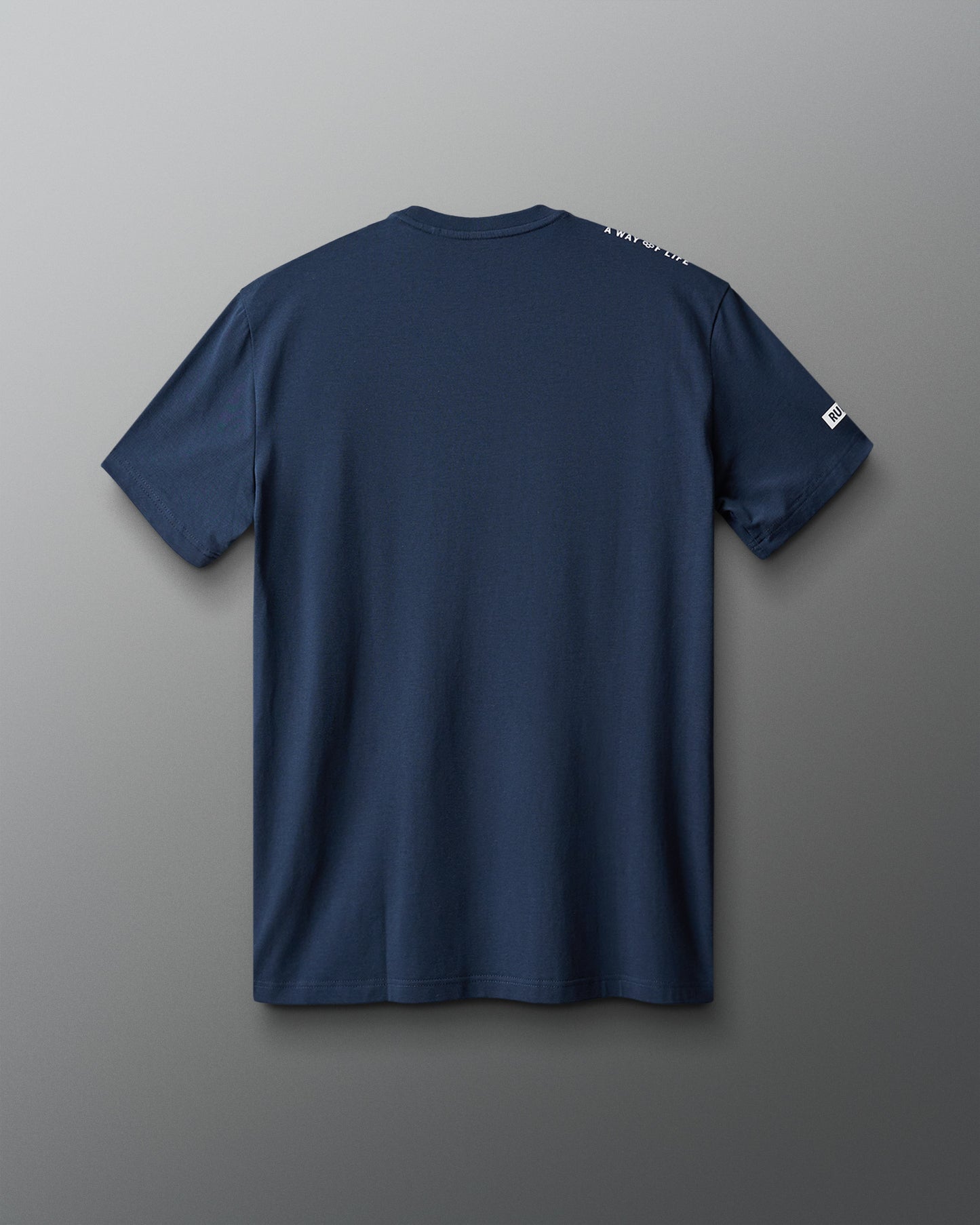 Navy blue t-shirt on a gray background