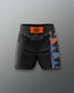 Black shorts with orange and blue pattern on a gray background