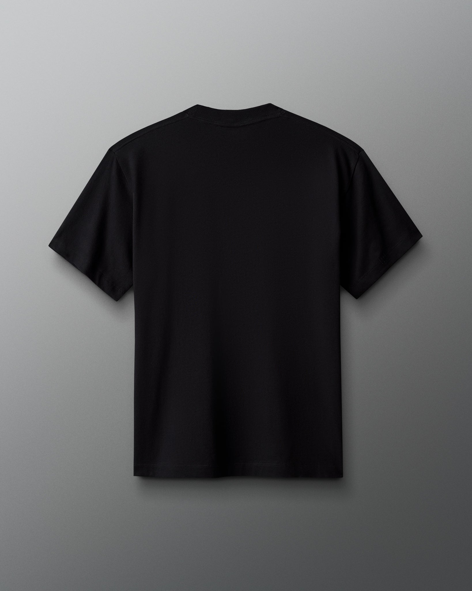 Black t-shirt on a gray background