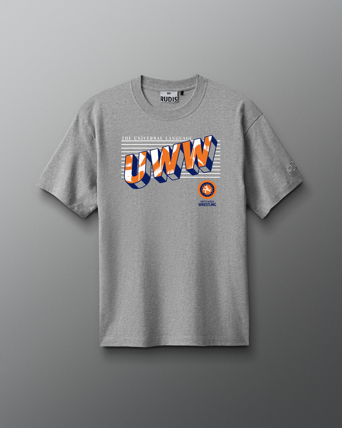 Heather gray RUDIS UWW Graffiti Heavyweight T-Shirt shown from the front, featuring a bold dimensional “UWW” graphic in orange, navy, and white with “The Universal Language” text and United World Wrestling branding. A subtle RUDIS mark finishes the sleeve.