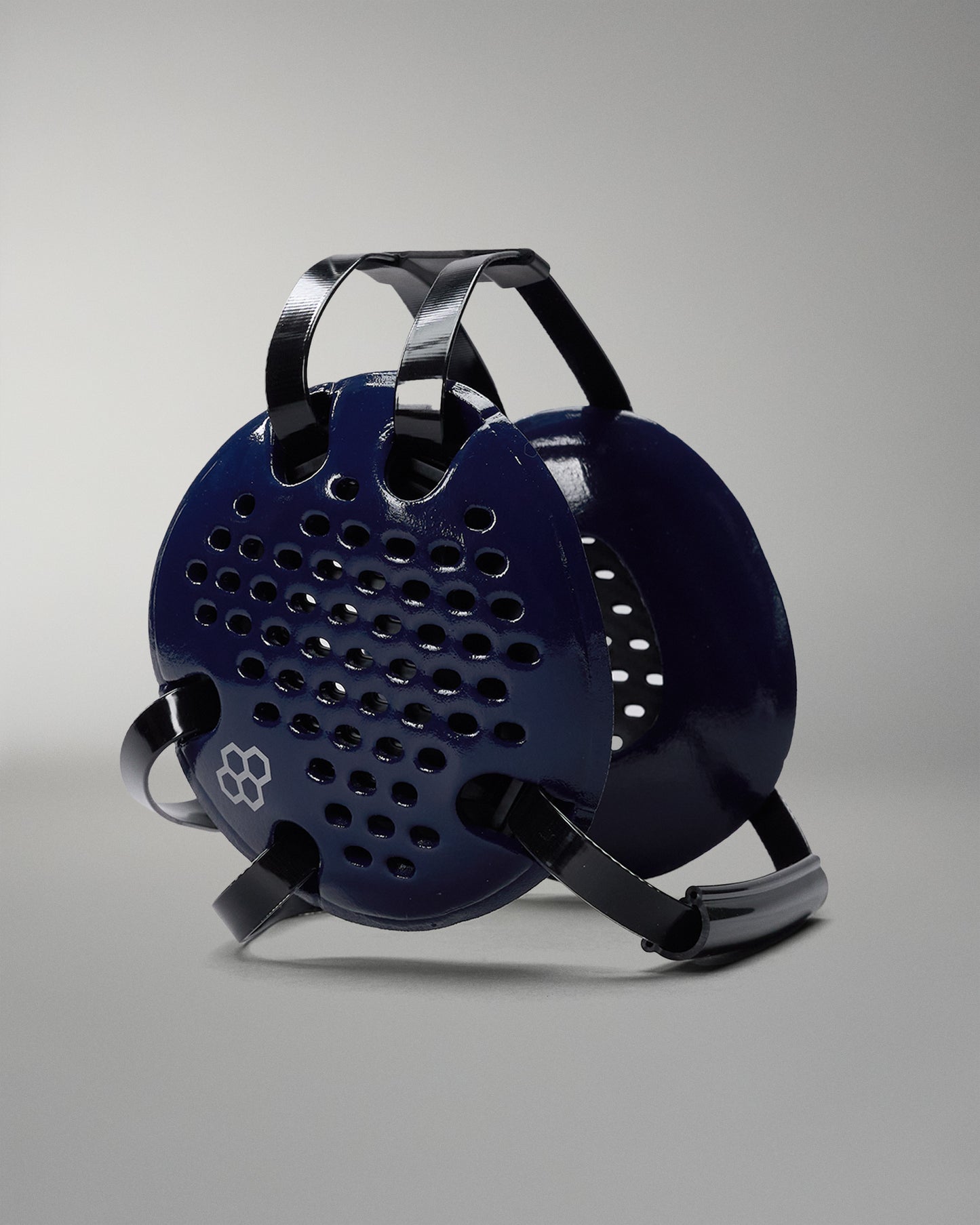 Blue and black grill on a gray background