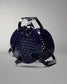 Blue and black grill on a gray background