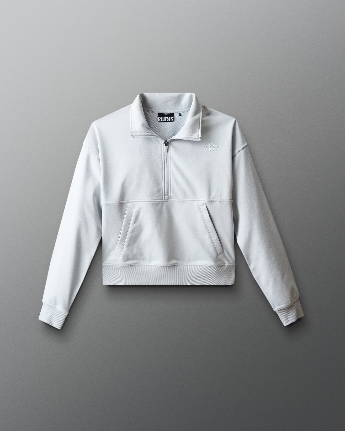 Light gray sweatshirt with a brand logo on a gray background