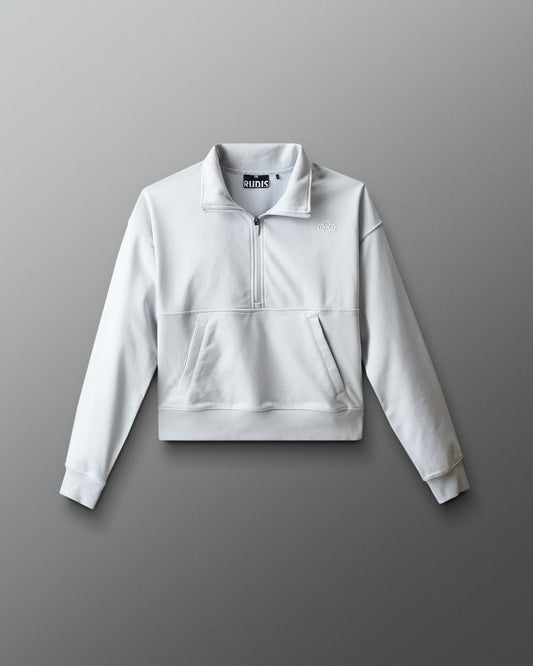 Light gray sweatshirt with a brand logo on a gray background