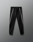 Black pants with white stripes on a gray background