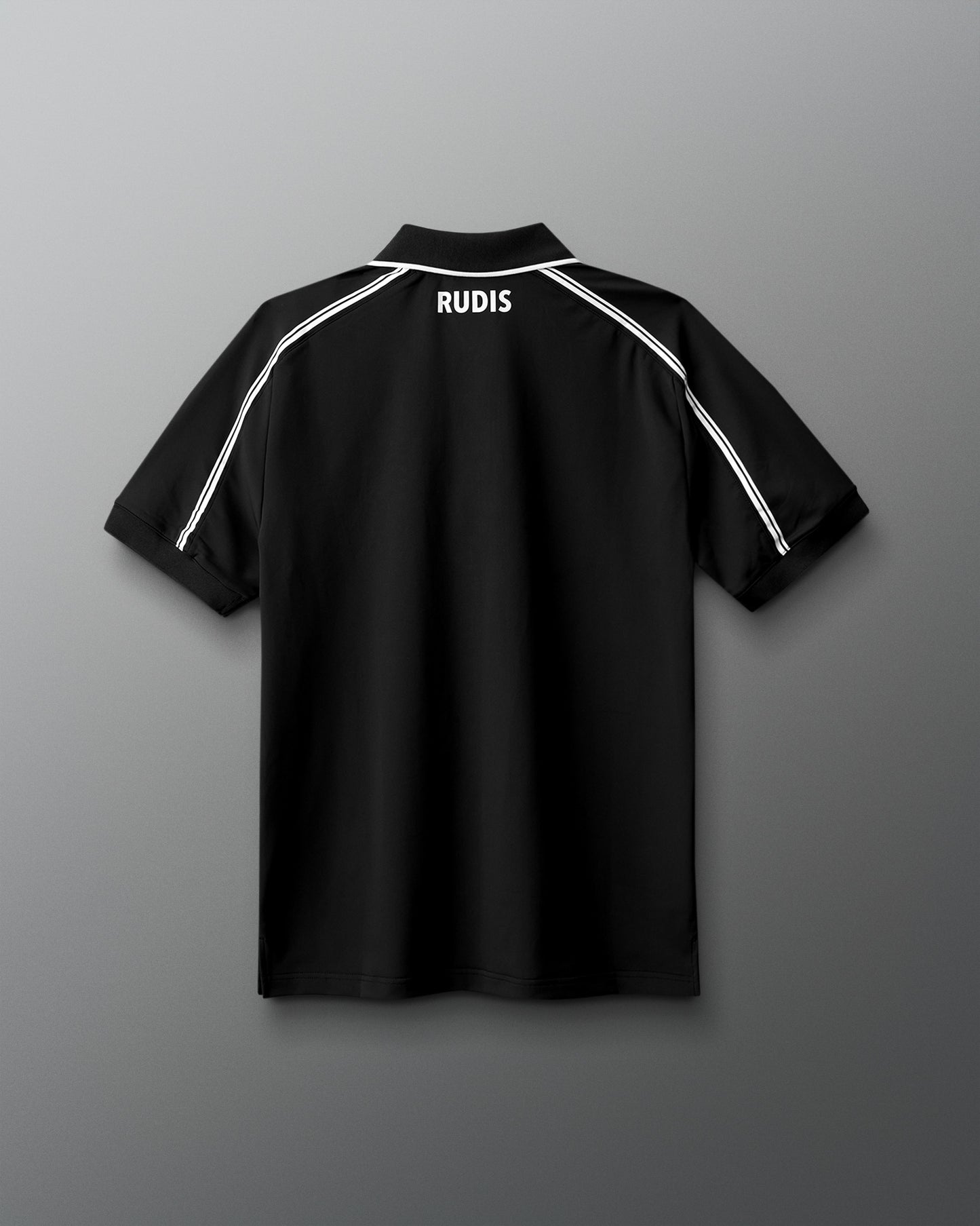 Black polo shirt with 'RUDIS' branding on a gray background