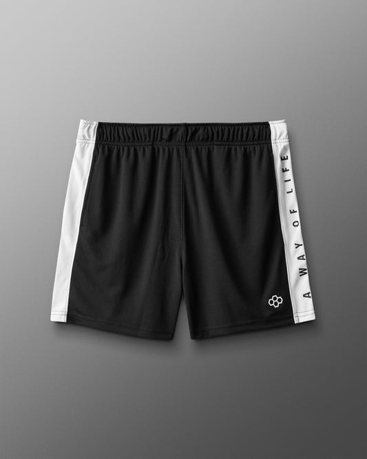 Black shorts with white side panels and branding on a gray background