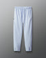 Light blue sweatpants on a gray background