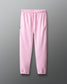 Pink sweatpants on a gray background