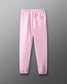 Pink sweatpants on a gray background