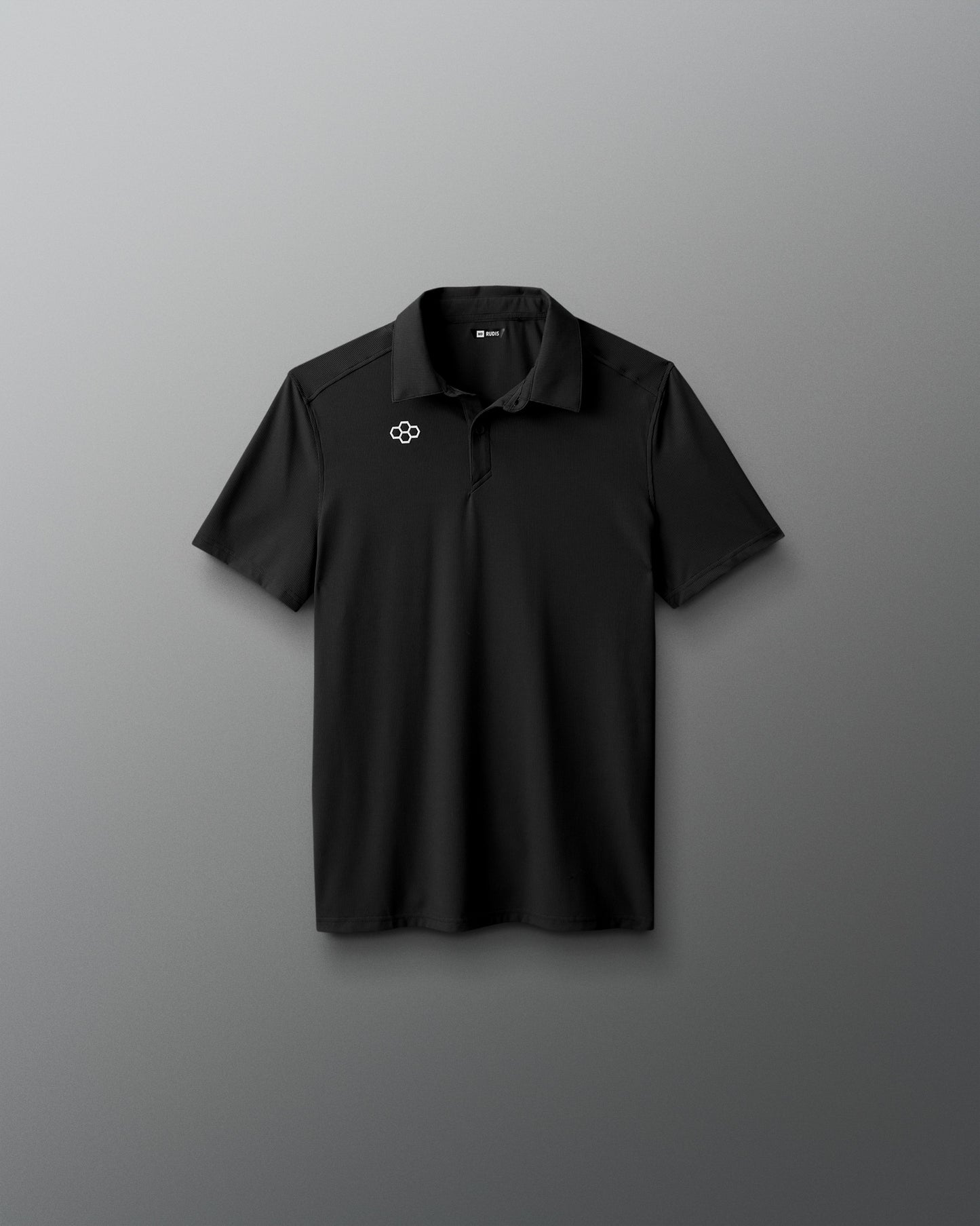 Black polo shirt with a logo on a gray background
