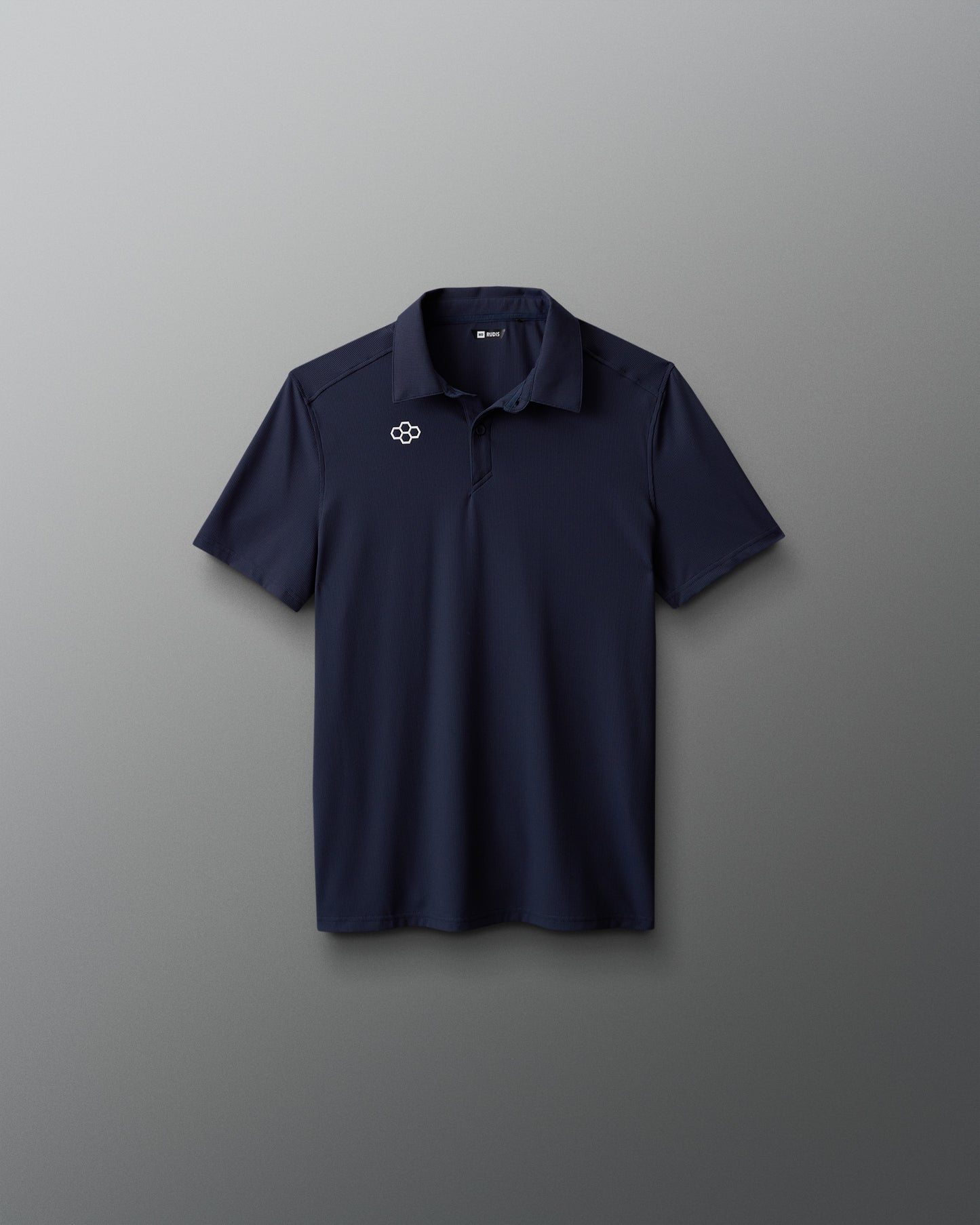 Navy polo shirt with a logo on a gray background