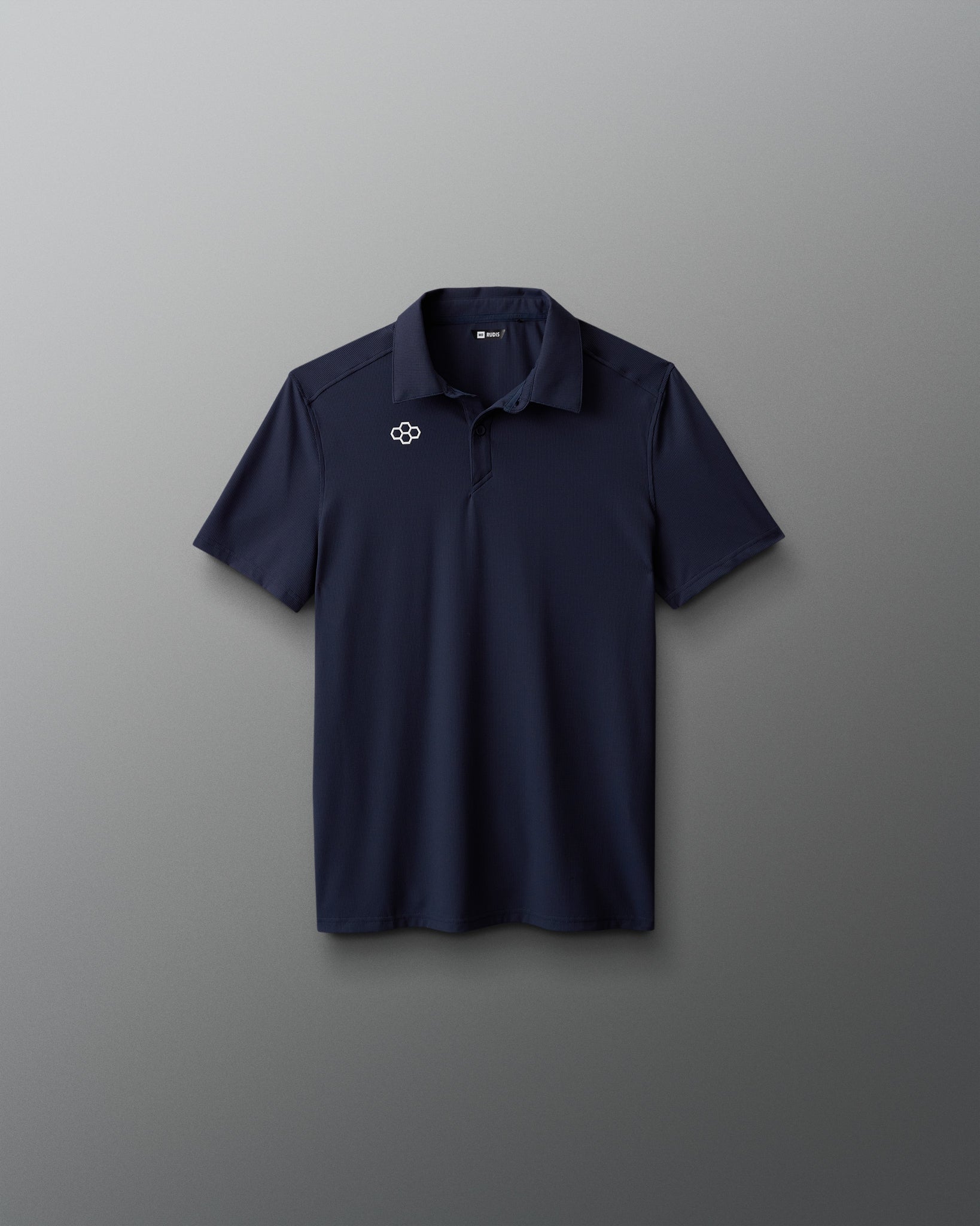 Navy polo shirt with a logo on a gray background