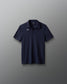 Navy polo shirt with a logo on a gray background