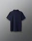 Navy blue polo shirt on a gray background