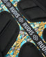 Close-up of the RUDIS Batman Double Cinch backpack back padding, breathable mesh construction, Batman comic print, and branded RUDIS webbing.