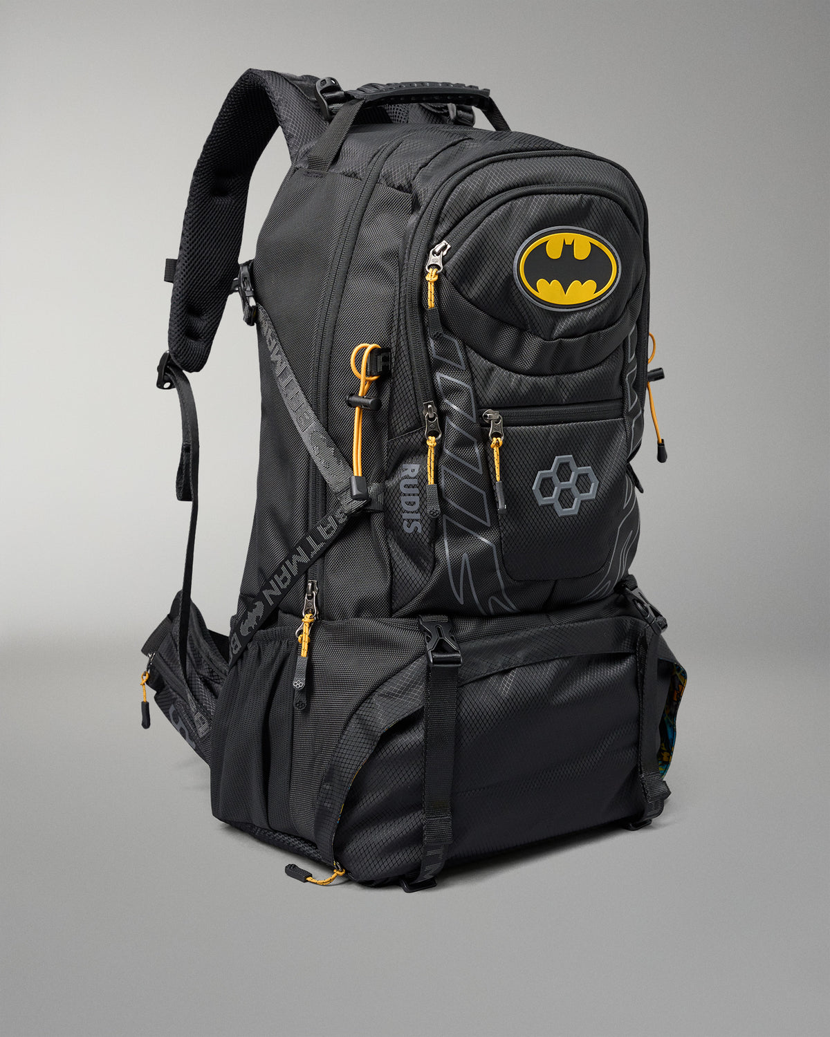 Black backpack with Batman logo on a gray background