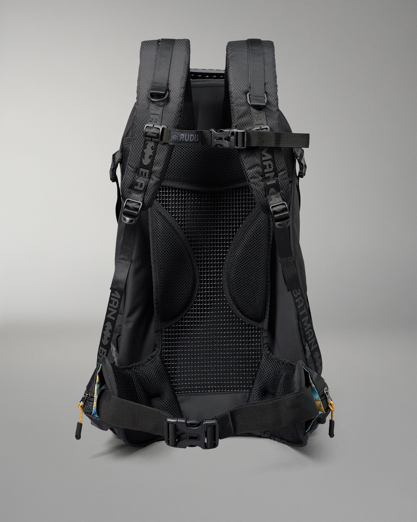Black backpack with visible branding on a gray background