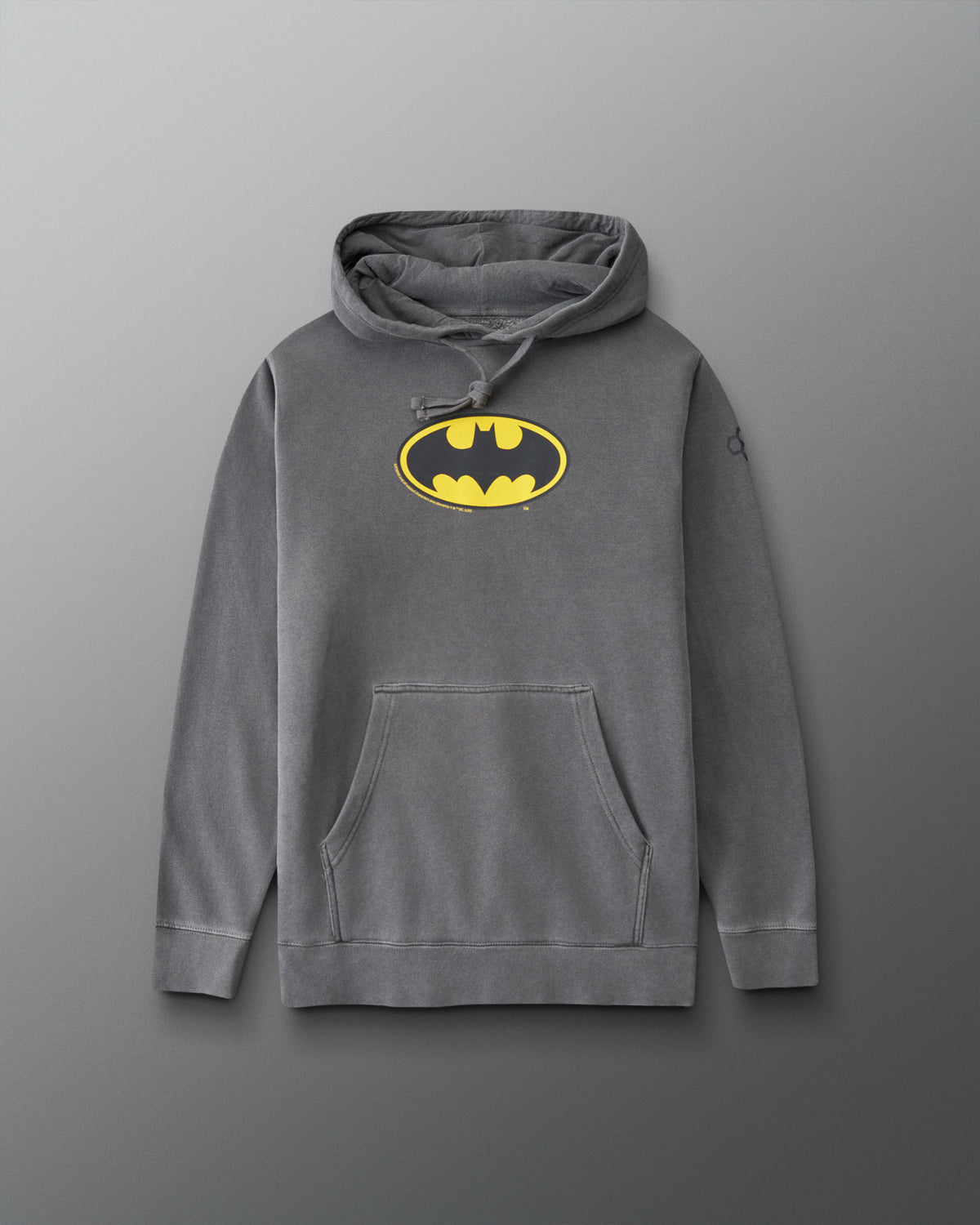 RUDIS Batman Icon Washed Hoodie in washed black with yellow Batman logo, drawstring hood, and front kangaroo pocket.