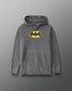 RUDIS Batman Icon Washed Hoodie in washed black with yellow Batman logo, drawstring hood, and front kangaroo pocket.