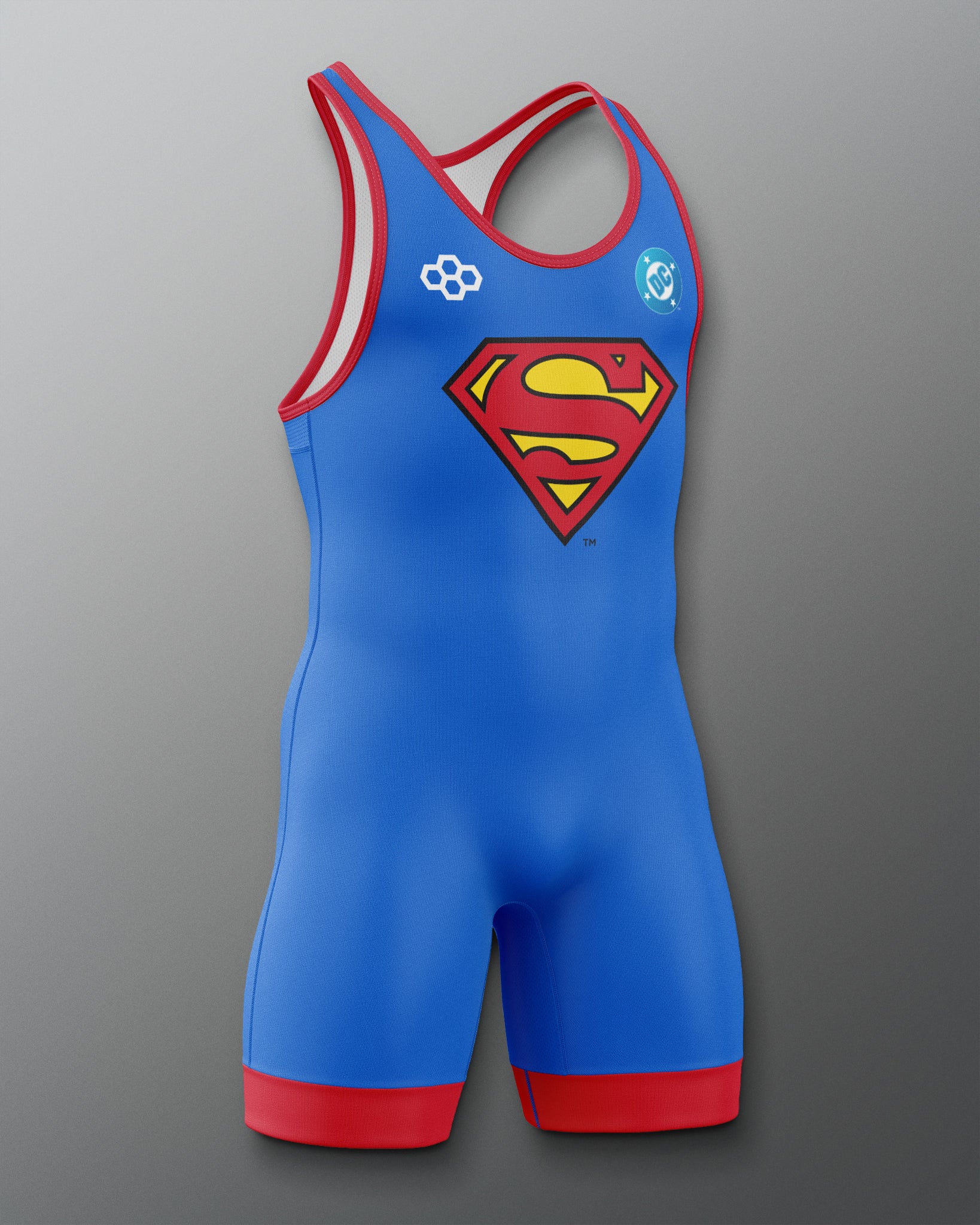 Angled view of RUDIS Superman Logo Elite 2.0 Wrestling Singlet featuring a blue design, red trim and Superman shield graphic.