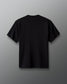 Back view of the RUDIS Scooby-Doo Relaxed Cotton T-Shirt in black, featuring a clean, solid-color design, short sleeves, crew neckline, and subtle RUDIS branding below the back collar.