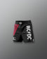 Black shorts with red accent and AC/DC logo on a gray background