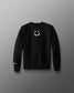 Black long-sleeve shirt with a white smiley face design on a gray background