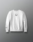White sweatshirt with a smiley face design on a gray background