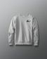 Gray sweatshirt with a Kolat logo on a gray background