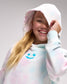 Person wearing a colorful hoodie with a smiley face design on a plain background
