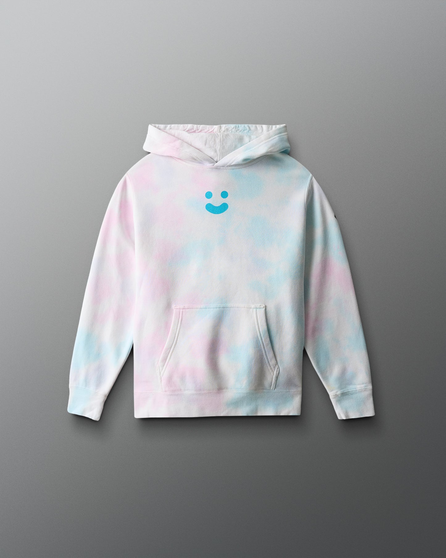 Tie-dye hoodie with a smiley face design on a gray background
