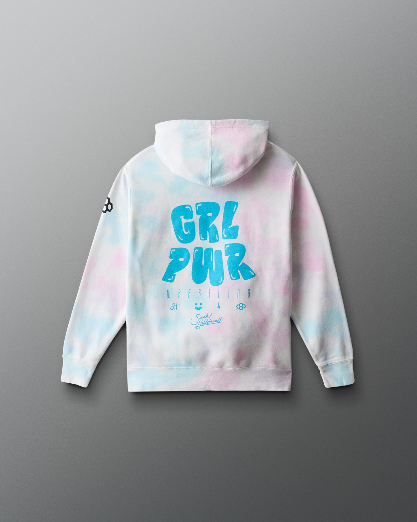 Tie-dye hoodie with 'GRL PWR' text on a gray background