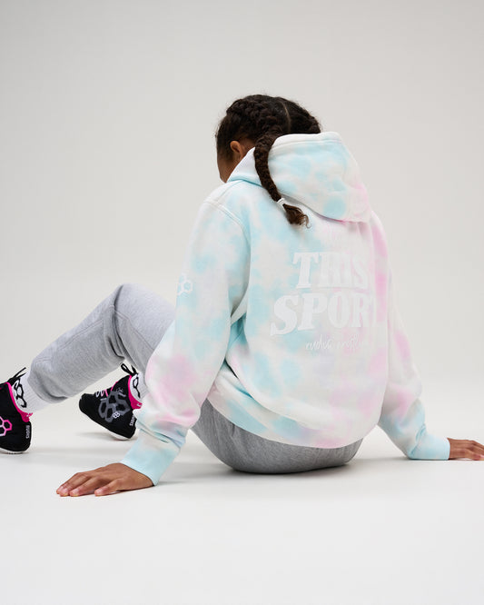 Back view of a young model wearing the RUDIS I Love This Sport Youth Tie-Dye Hoodie in Pastel, featuring soft pink and blue tie-dye colors and white "I Love This Sport" wrestling graphics across the back.