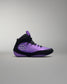 Purple and black wrestling shoe on a gray background