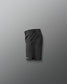 Black athletic shorts on a gray background
