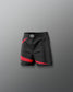 Black shorts with red accents on a gray background