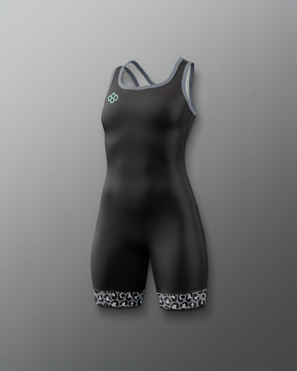 A black one-piece athletic Wrestling singlet with gray shoulder straps and patterned black-and-white cuffs at the legs, shown on a neutral gray background.