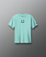 Light blue t-shirt with a smiley face design on a gray background